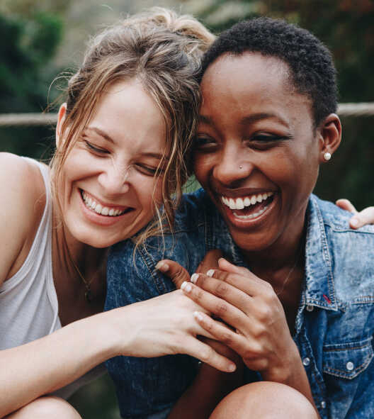 two ladies laughing